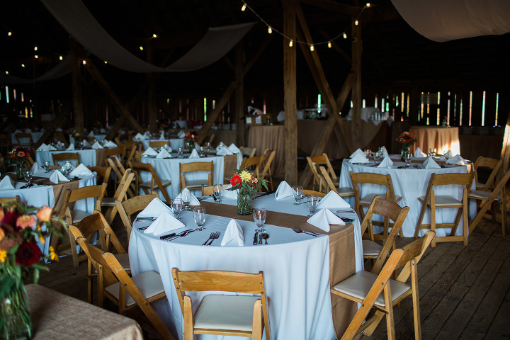 Wedding reception set up, white table cloth, table decor